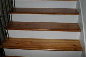 Antique Heart Pine Stair Treads with bullnosing and left hand return