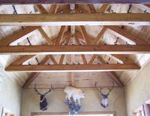Antique Heart Pine Beams installed in Columbus, MS Trophy Room by CGI